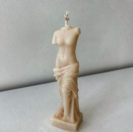 Statue of virgo candle